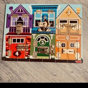 Melissa and Doug Latches Board Like New Condition for ages 3+ Fine Motor Skills